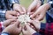 Business people Holding Jigsaw Puzzle, group of business people using a jigsaw puzzle to demonstrate the need to work in the same