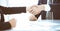 Business people or lawyers shaking hands finishing up a meeting, close-up. Negotiation and handshake concepts