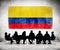Business People in a Meeting with Colombian Flag