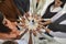 Business people or office workers hold pieces of wooden puzzles that symbolize teamwork.