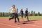 Business People Running On Racing Track