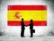 Business People with Spanish Flag