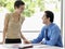 Business People Talking At Desk