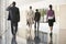 Business People Walking On Marble Flooring