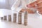 Business Person Placing Coin Over The Increasing Coins Stack.