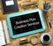 Business Plan Creation Services on Small Chalkboard. 3D.