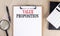 BUSINESS PRINCIPLES text on clipboard on wooden background