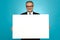 Business representative holding blank ad board