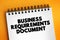 Business Requirements Document - business solution for a project, text concept on notepad