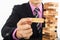 Business risk concept with wood jenga game