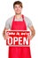 Business shop owner showing open sign