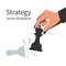 Business strategy. Strategist holding in hand chess figure black king.