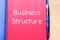 Business structure write on notebook