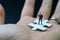 Business success strategy with missing jigsaw key person, miniature people businessman thinking and standing on white jigsaw