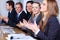 Business team clapping hands during meeting