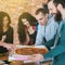 Business team millennials lunch break pizza meal