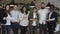 Business team of multiracial people standing in front of camera during meeting work