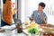 Business team workers discussing work and prepare pizza and potato chips to sharing meal at lunch break for good relations in