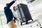 Business travelers put baggage on X-ray machine try to detection metal prevention at the airport