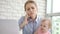 Business woman with baby speaking phone. Business mother working