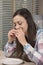 Business woman eating a meal over a desk, office situation