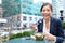 Business woman eating salad on lunch break