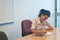 Business woman examining contract agreement in office