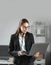 Business woman freelancer using laptop typing on pc notebook, surfing internet in office. Secretary woman in formal wear