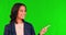 Business woman, green screen and pointing to menu steps and timeline template choice. Happy, female employee face and