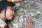 Business woman Hand Protecting With Stacked lots Coin, Portrait of beautiful happy young lady hands Pick up money