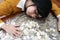 Business woman Hand Protecting With Stacked lots Coin, Portrait of beautiful happy young lady hands Pick up money on wooden table