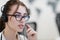 Business woman with headsets at work