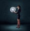 Business woman holding glowing planet earth