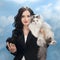 Business woman photographer and her cat on