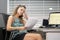 Business woman reading a document in office workspace