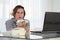 Business woman reading a document in office workspace