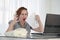 Business woman reading a document in office workspace