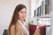 Business woman Searching files and and reading book in the cabinet or books shelves