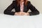 Business woman sitting at desk and waiting for interviewer - int