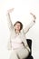 Business woman stretching on chair