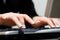 Business woman typing on computer keyboard