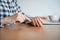 Business woman using smartphone on desk at home office. On the modern table working have laptop