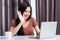 Business woman video call conferencing with team by webcam laptop com