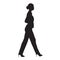 Business woman walking, side view, isolated