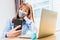 Business woman wearing face mask protective using smart mobile phone for reading SMS message