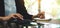 A business woman working , calculating and writing on notebook in office