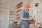 Business woman working at her pottery store