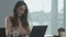 Business woman working at laptop. Closeup portrait of concentrated person.