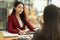 Business women interviewing female candidate at job interview. human resource