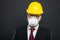 Business young man wearing hardhat and protection mask